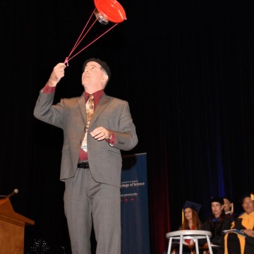 image of Bruce Bayly doing a demo at graduation